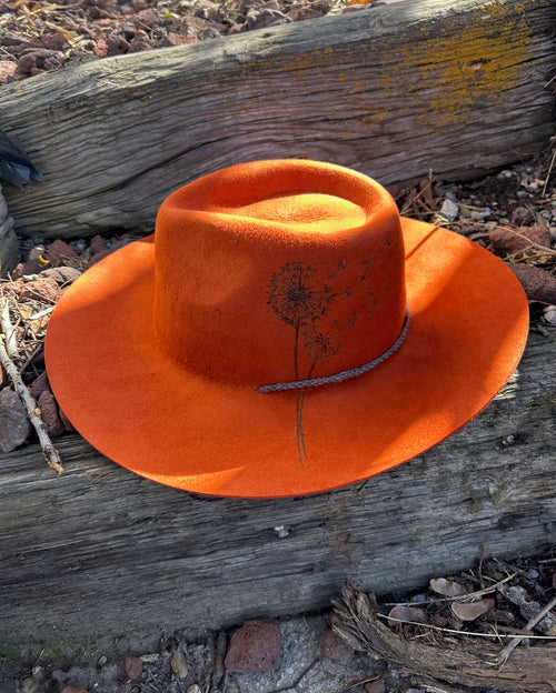 Hleritz Customs Delta Dandelion wool hat, featuring minimalist, custom dandelion pyrography and a hand braided band that doubles as a stampede string.